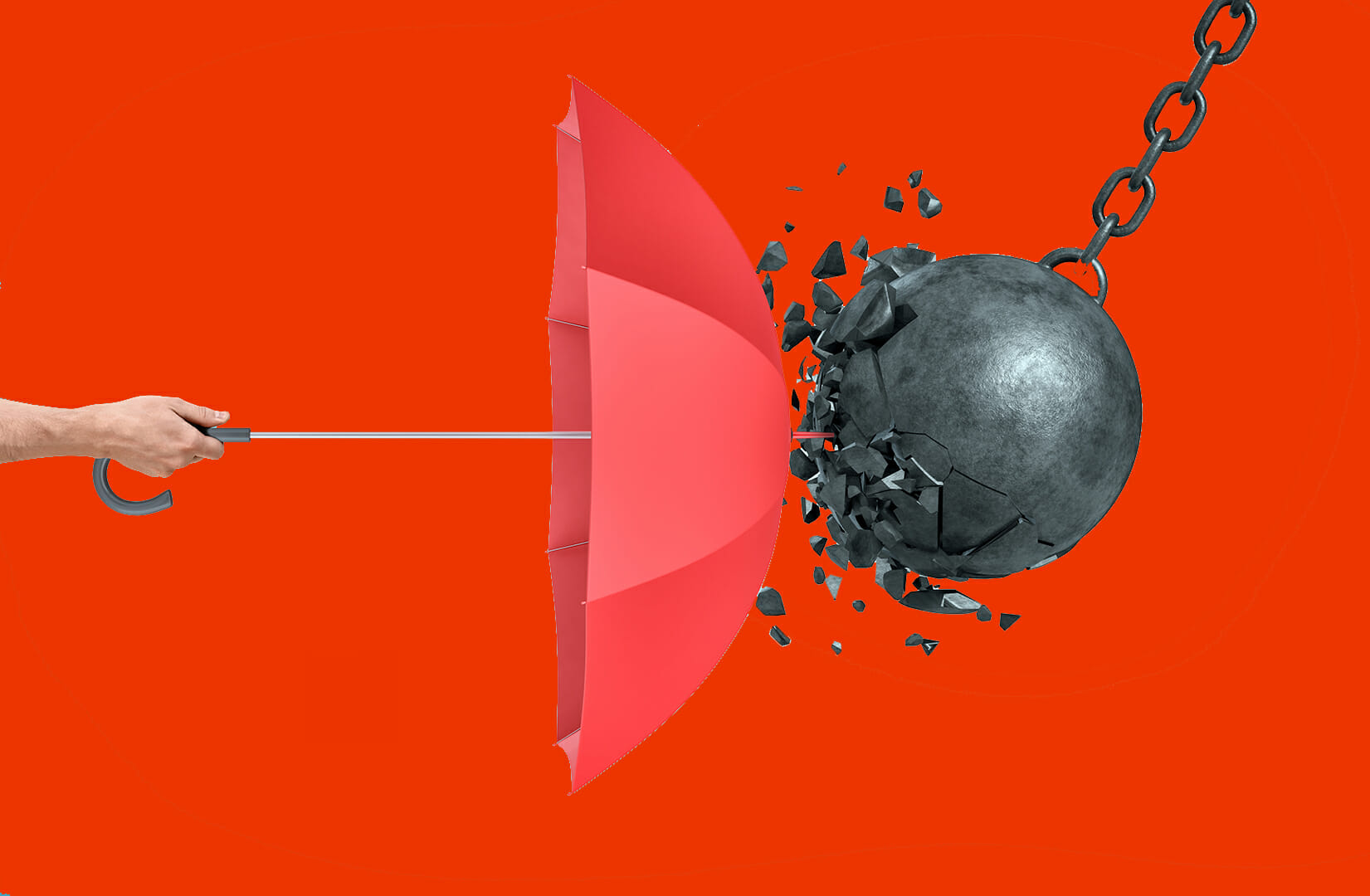 Hand holding an open red umbrella which protects from a collision with a broken wrecking ball - CISO